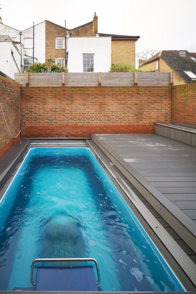 Swimming pool in a walled garden