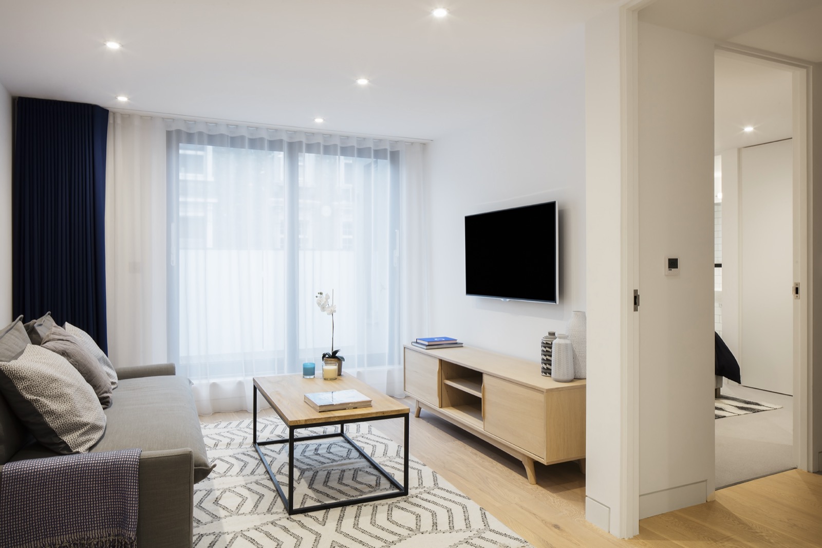 Living room with a fitted media unit