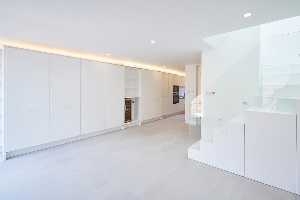 Open-plan living space with fitted storage