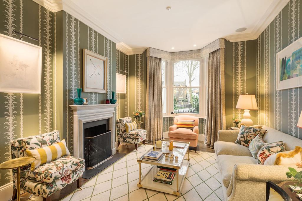 Drawing room with patterned wallpaper and bay window, design and build in Forest Gate and Newham