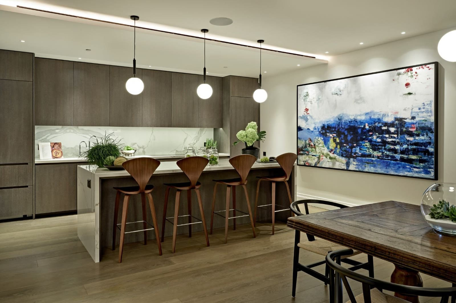 Kitchen with breakfast bar and dining table in Woodford