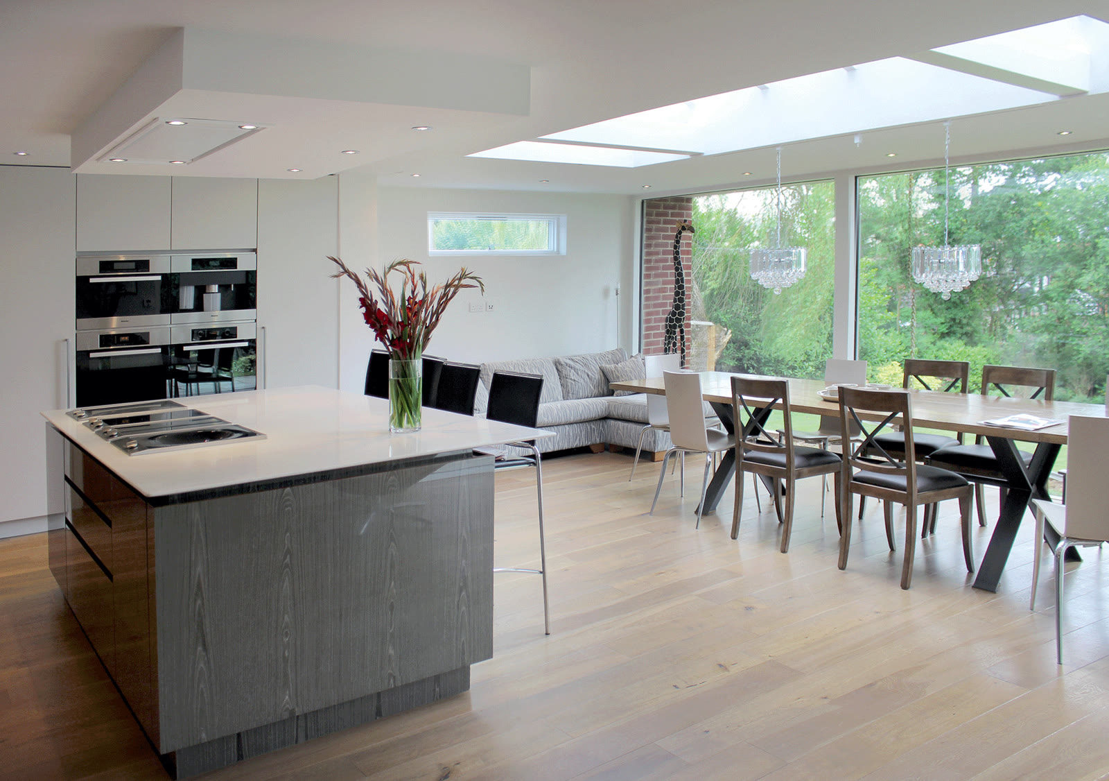 Kitchen extension with rooflights opening onto the garden in Emerson Park