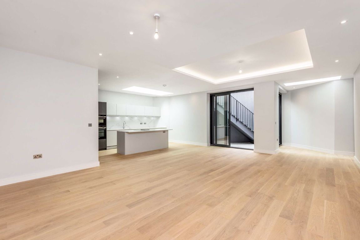 Open-plan kitchen and living space after renovation in Forest Gate