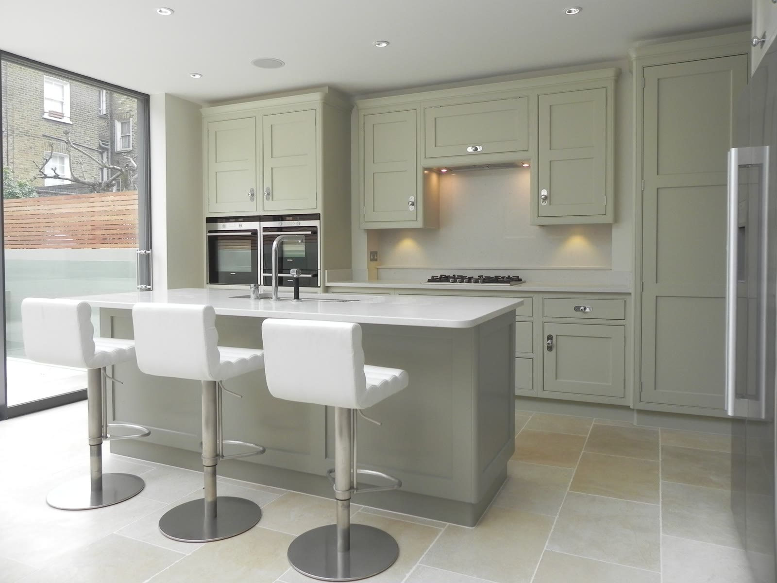 Shaker kitchen with island in a kitchen extension in Upminster
