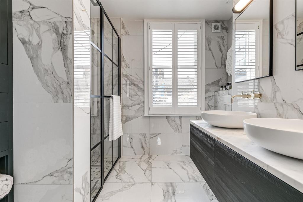 Marble en suite with double basins, house renovation in Chigwell