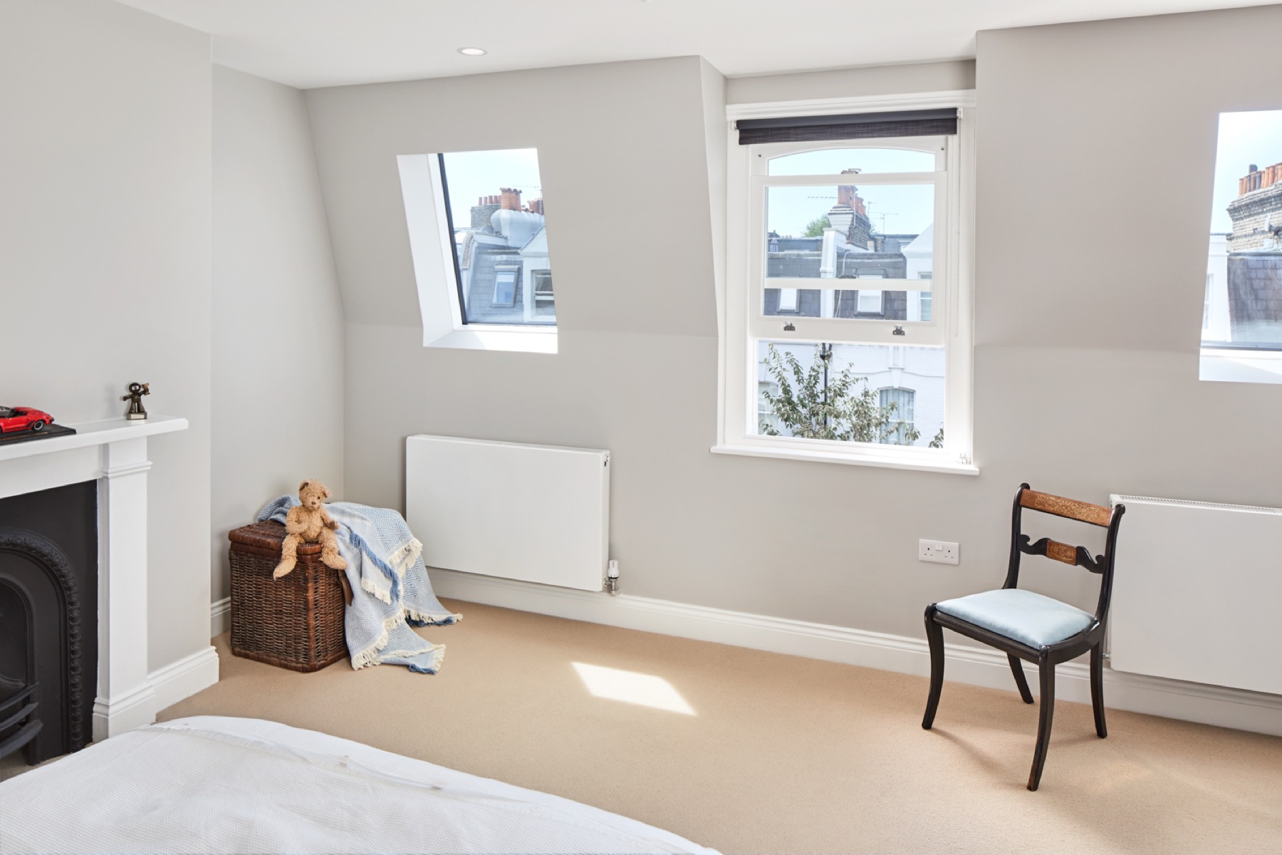 Loft bedroom with dormer and sash windows, loft conversion in Woodford